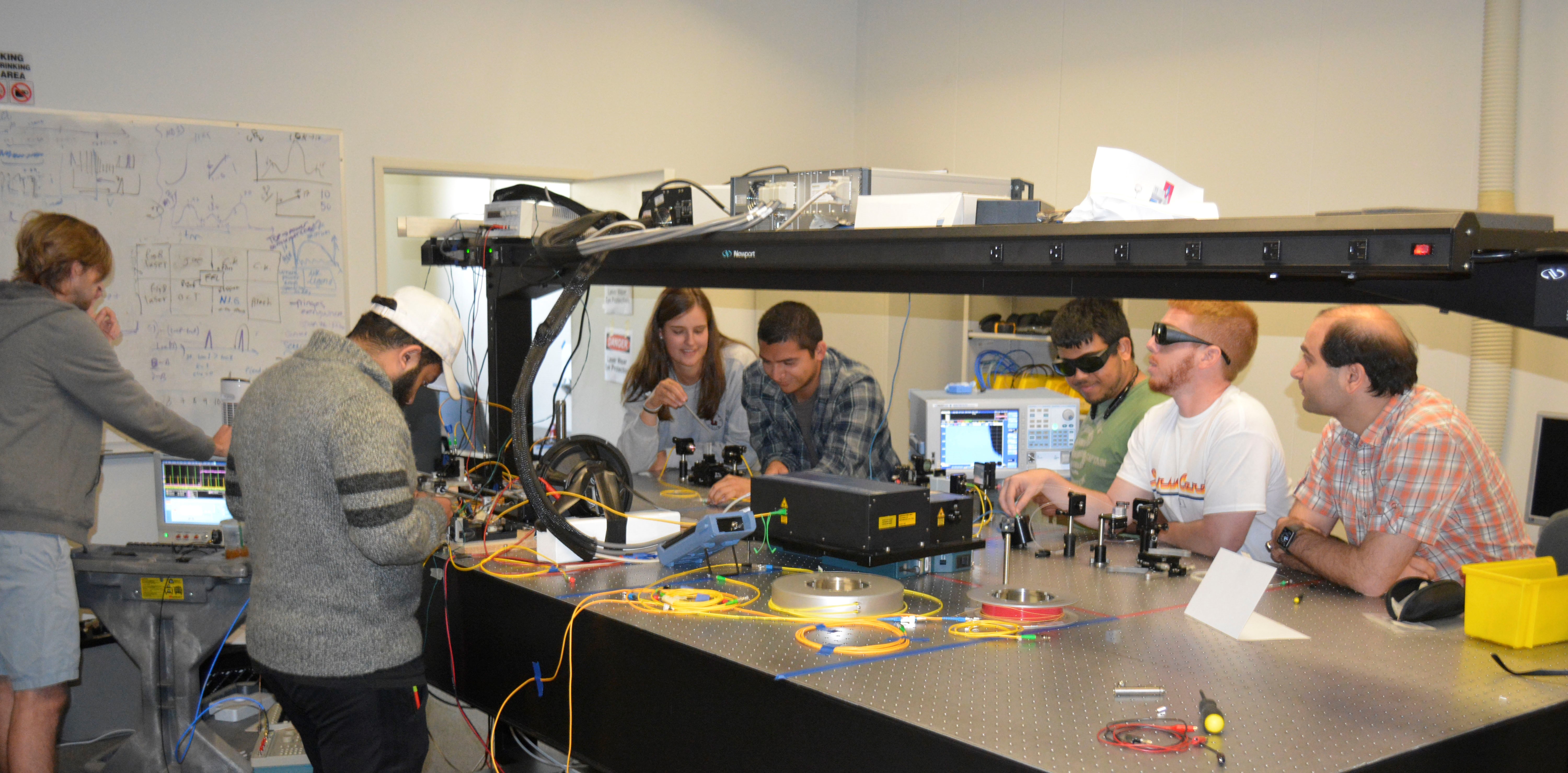 Students working on various projects in the photonics laboratory
